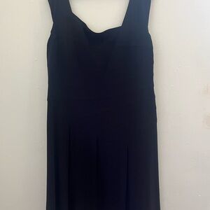 Rich and stylish enjoy this Black Sleeveless Dress